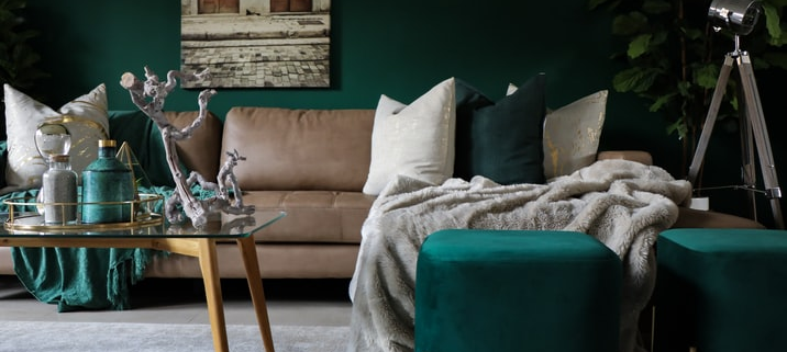 Living room with vibrant green and brown furniture