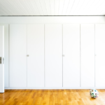 A hinged wardrobe designed by an interior manufacturer in Perivale